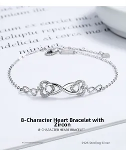 Macro detail of 925 sterling silver infinity heart bracelet with cubic zirconia