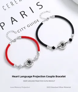 Detail of S925 silver projection bracelet with woven rope and stone for couples