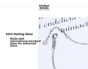 Detailed macro view of S925 sterling silver chain featuring lobster clasp and heart tag