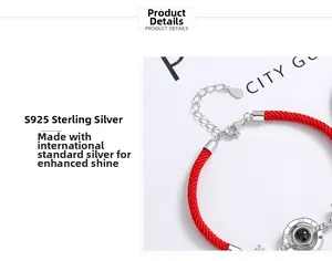 Detailed macro view of S925 sterling silver lobster clasp and red woven rope bracelet