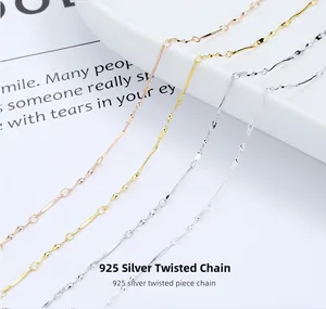 Macro shot of 925 sterling silver twisted chains in gold, rose gold and silver finishes