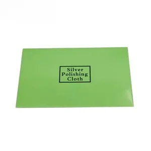 Green envelope packaging for a professional silver polishing cloth for jewelry