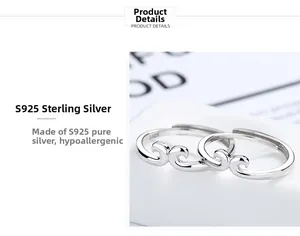 Detailed macro view of S925 sterling silver couple rings with wave pattern engraving