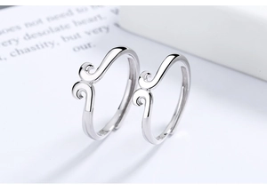 Detailed view of S925 sterling silver Monkey King bar couple rings with polished finish