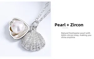 Macro detail of S925 silver shell pendant with freshwater pearl and AAA+ zircon stones