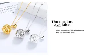 Close-up of S925 sterling silver bell pendants with hollow floral texture in three colors