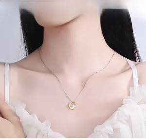 Close-up of 925 silver moon rabbit necklace worn on a neck with elegant gold plating