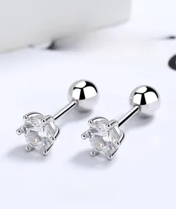 Macro shot of 925 sterling silver six-prong stud earring with round cubic zirconia stone