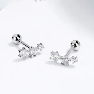 Macro shot of S925 sterling silver screw back earrings with three cubic zirconia stones
