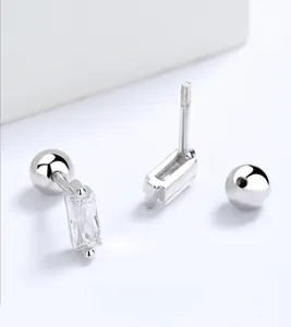 Macro shot of S925 silver stud earring featuring rectangular zircon and threaded screw back