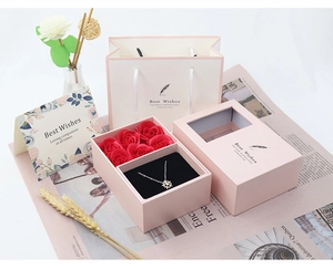 Gift box set with snowflake necklace, six red soap roses, paper bag and greeting card