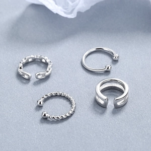 Set of four S925 sterling silver ear cuffs featuring chain and twisted rope patterns