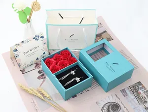 Tiffany blue jewelry gift box with red soap roses, earrings, gift bag and greeting card