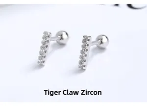 Macro detail of S925 silver rectangular bar earrings with claw-set zircon and screw backs