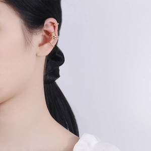 Set of four gold S925 sterling silver ear cuffs with twisted and minimalist textures