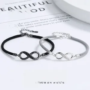 Macro view of adjustable woven infinity symbol bracelets with S925 silver and zircons