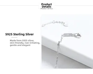 Detailed macro view of S925 sterling silver lobster clasp with heart charm and engraving
