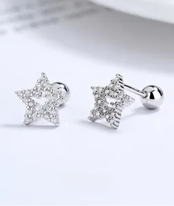 Macro detail of S925 sterling silver star earrings with cubic zirconia and screw back