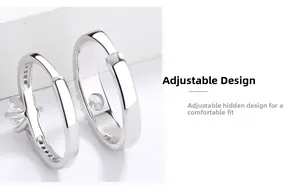 Detail of adjustable six-prong silver ring with sparkling zircon and hidden sizing band
