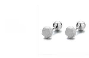 Detail view of S925 sterling silver hexagonal stud earrings with brushed metal texture