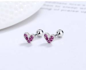 Macro shot of 925 silver heart screw back studs with pavé pink cubic zirconia stones