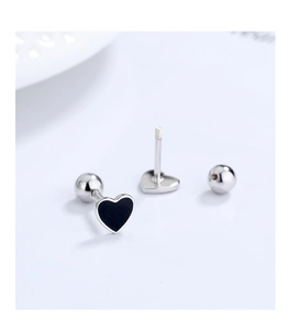 Detailed macro view of 925 silver heart stud earrings with black enamel and screw back