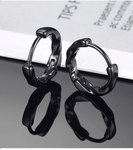Macro shot of black Mobius hoop earrings in S925 sterling silver with twisted texture