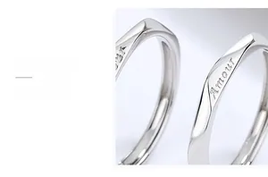 Macro view of polished S925 sterling silver ring featuring the Amour engraving