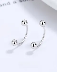 Macro view of S925 sterling silver U-shaped screw thread earrings with polished beads