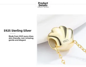 Macro view of S925 sterling silver cat paw pendant with clear hallmark and gold plating