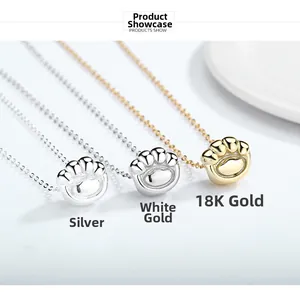 Detailed view of S925 sterling silver cat paw pendants in silver, white gold and 18K gold