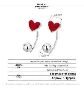 Detail view of red enamel heart 925 sterling silver earrings with 5.8mm width dimensions