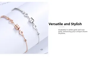 Detail of rose gold and silver geometric bracelets on an open magazine page
