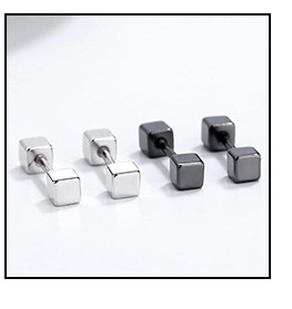 Detailed view of square geometric barbell earrings in polished silver and black finish
