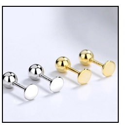 Macro view of gold and silver ball stud earrings with flat back screw design in steel