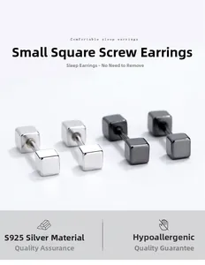 Macro shot of 925 sterling silver square screw-back earrings in silver and gun black