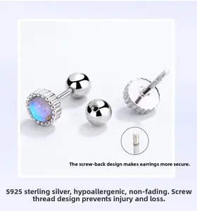 Detailed macro view of S925 sterling silver studs with screw-back and colorful opal stone