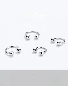 Close-up of S925 sterling silver U-shaped screw earrings with ball ends set of four