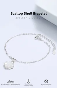 Macro shot of 925 silver ginkgo leaf bracelet featuring white mother-of-pearl shell