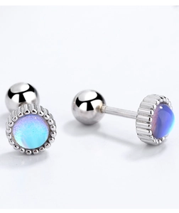 Close-up of geometric moonstone earrings with silver screw backs and iridescent blue gems