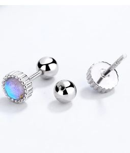 Detailed macro view of S925 sterling silver screw back stud with round blue fire opal stone