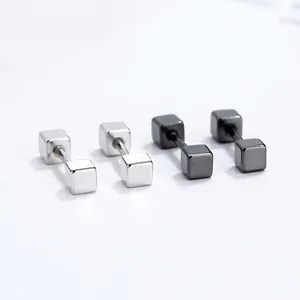 Detail of 925 sterling silver geometric cube dumbbell earrings in silver and black colors