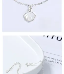 Macro view of 925 sterling silver ginkgo leaf bracelet with white mother of pearl inlay