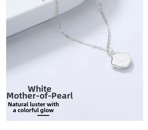 Detailed view of cloud-shaped S925 silver necklace with iridescent white mother of pearl