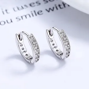 Close-up of S925 sterling silver hoop earrings with pave-set cubic zirconia stones