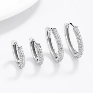 Silver-tone 925 sterling silver hoop earrings set with sparkling pave-set cubic zirconia