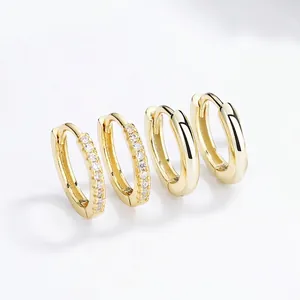 Polished and crystal-studded gold-plated hoop earrings set for women's elegant style
