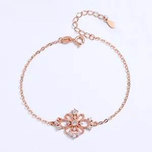 Detailed view of rose gold S925 silver bracelet featuring hollow flower zircon charm