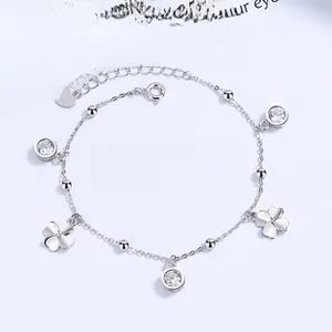 Detailed view of S925 sterling silver four-leaf clover bracelet with zircon charms