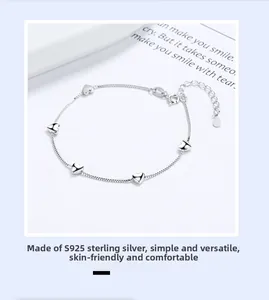 Detailed view of S925 sterling silver bracelet featuring five minimalist heart charms